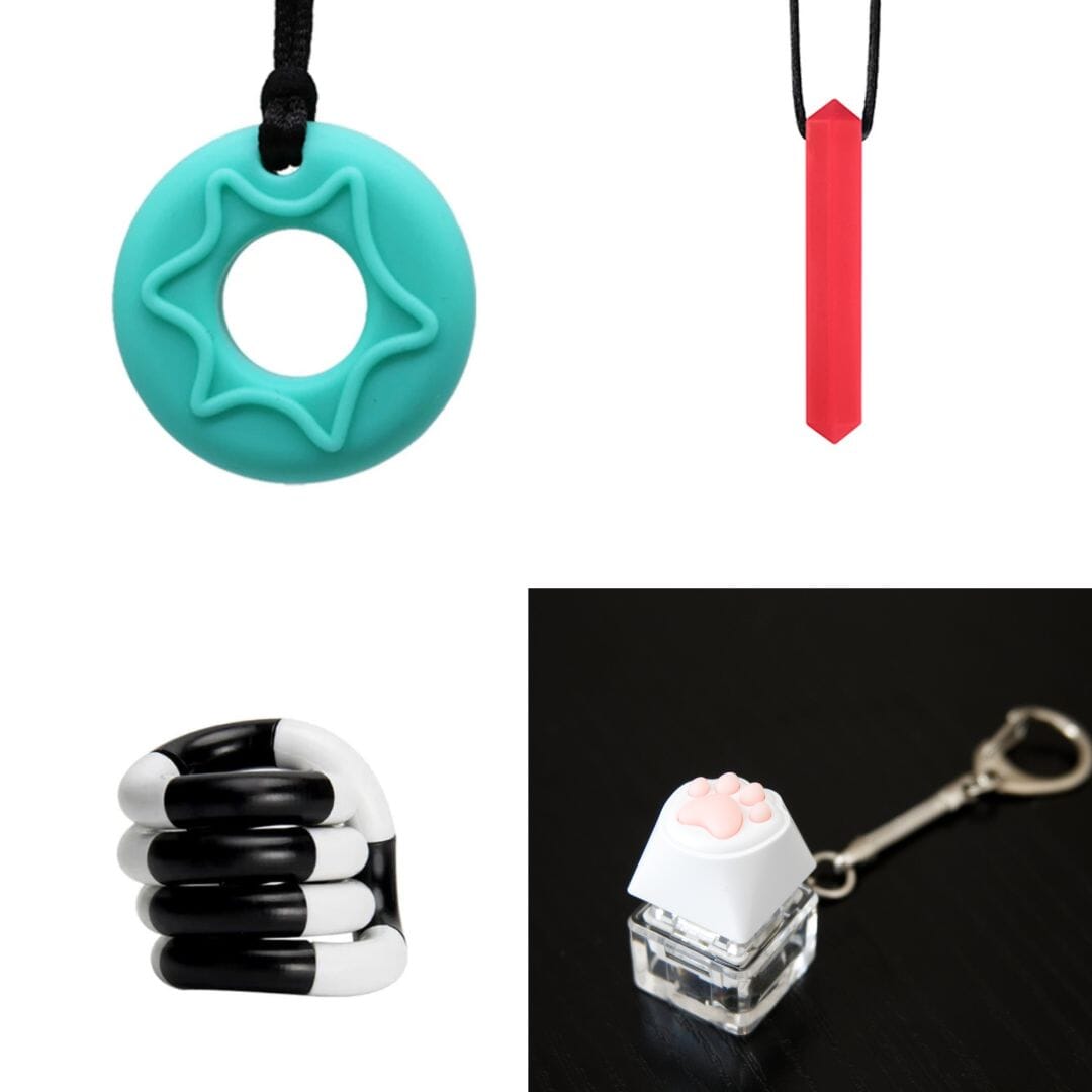 An image showing items from the 2 Chew Necklaces + 2 Fidget Toys Bundle: a teal circular pendant with a cutout star pattern, a red rectangular pendant, a twisty black-and-white sensory fidget toy, and a small paw keyboard fidget keychain featuring a white cat paw button attached to a transparent cube.