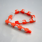 Snap and Click Fidget Toy Orange & White 