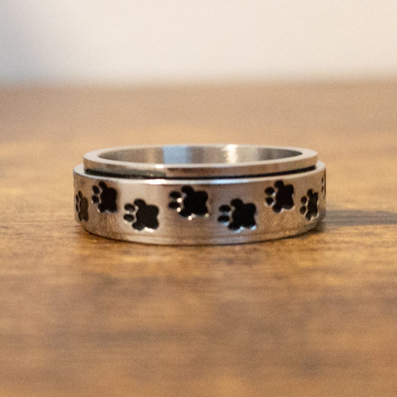 Paw Print Spinner Fidget Ring - The Autistic Innovator