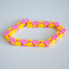 Snap and Click Fidget Toy Pink & Orange 